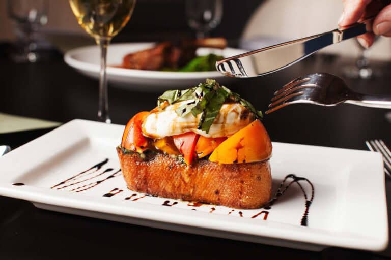 Gourmet bruschetta with tomatoes and mozzarella cheese.